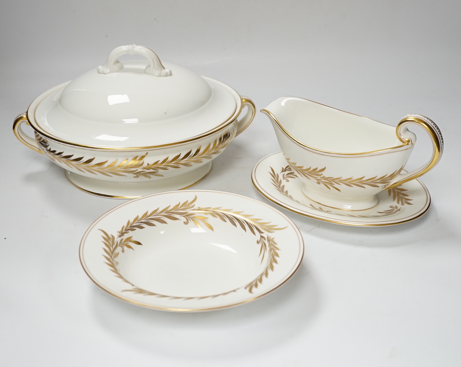 A Minton Malta pattern part dinner service comprising a lidded tureen, dinner plates, side plates, bowls, etc. (32)